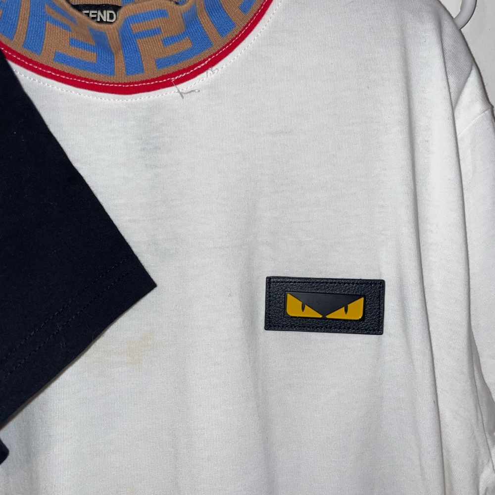 Fendi shirt worn twice. Shirt is a medium but fits between a small and medium